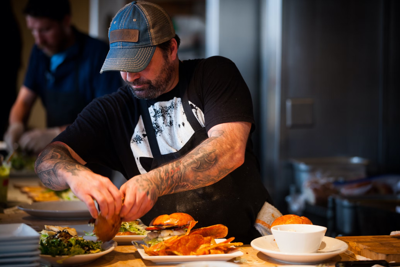 people preparing food at a restaurant